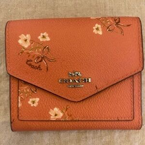 Salmon pink Coach wallet in excellent condition!